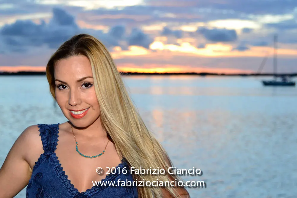 Portrait by the water at sunset
